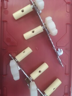 Encore Tuning Pegs. Encore Tuning Pegs showing them broken.
